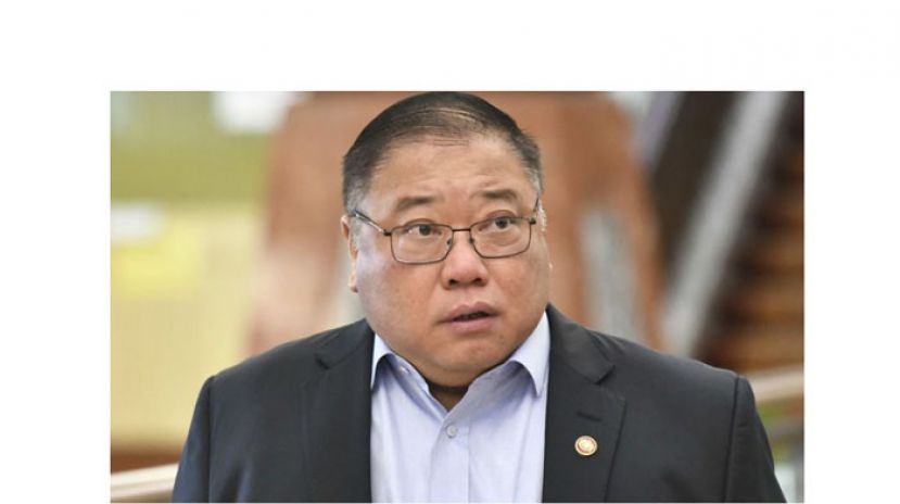 拿督斯里张庆信。