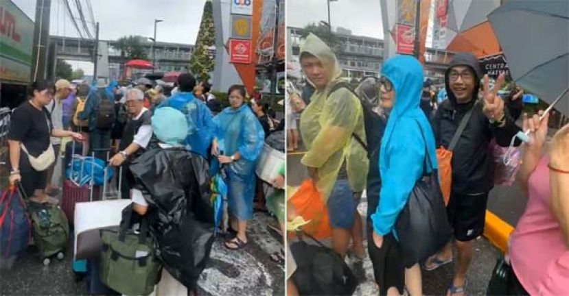 泰南水灾 苦熬多天终可归家，获救国人笑脸比V手势。