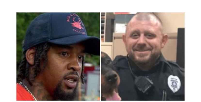 黑人男子麦克李（左）奋不顾身救出警员汉利。