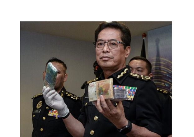 丹斯里阿占巴基。