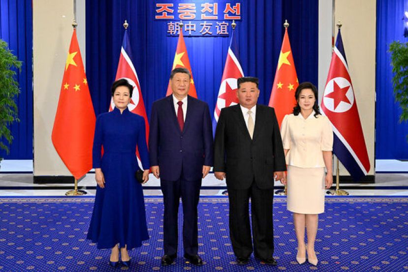 习近平和夫人彭丽媛出席金正恩举行的欢迎宴会。