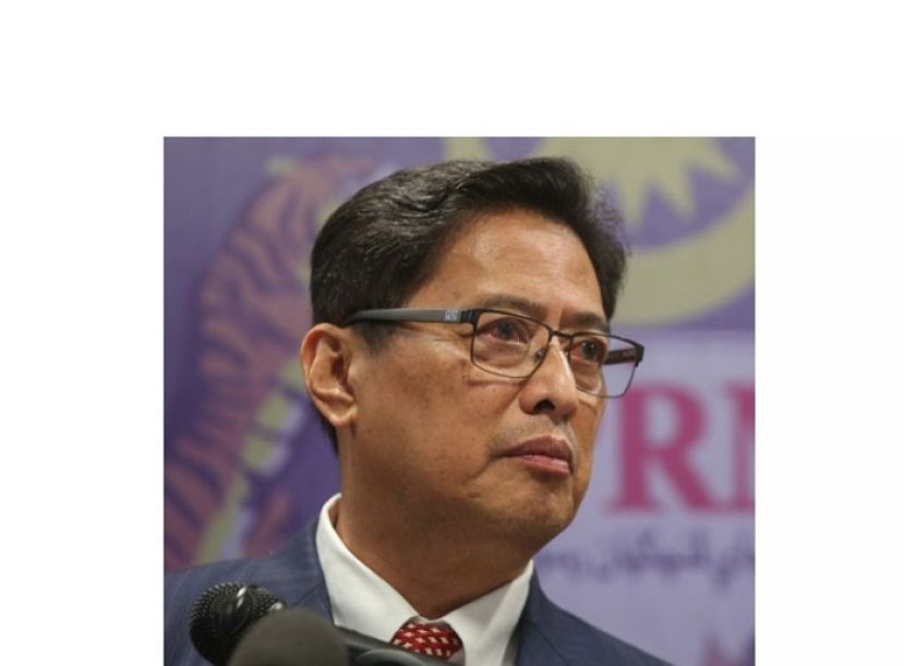 丹斯里阿占巴基。