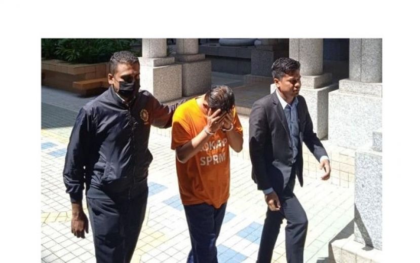 前部长特别事务官被带上推事庭申请还押。
