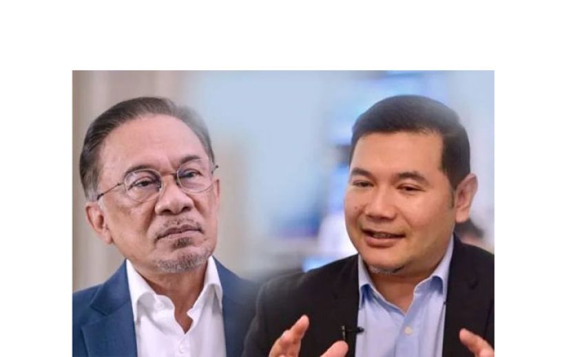 首相安华(左)与拉菲兹(右)。