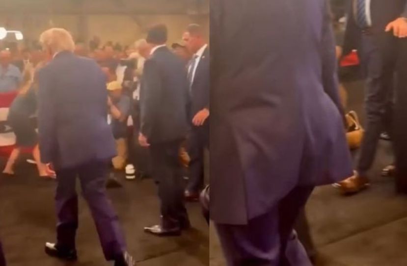 特朗普于纽约长岛出席活动后走下舞台，深色西装下摆被捕捉到明显的方形隆起物，影片释出后随即在社交媒体引发广大网友对特朗普健康状况的推测。