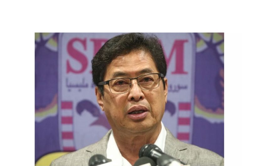 丹斯里阿占巴基。