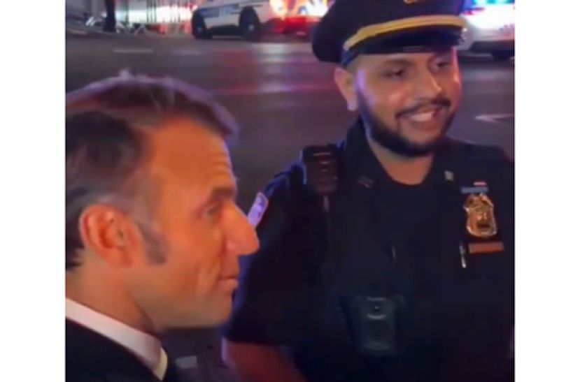 马克龙原本搭乘座车返回领事馆，却在途中被警察拦下。