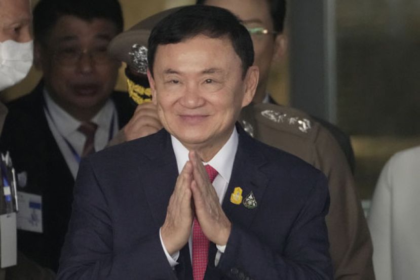 泰国前首相他信22日获判无罪。