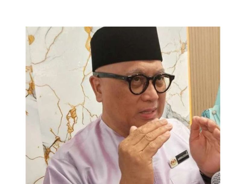 教育部秘书长阿米努丁。