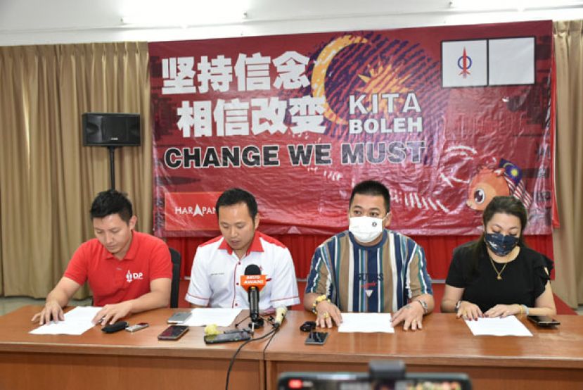 左起为张健仁特别助理沈杰龙、特别助理江峰年与李姓夫妇。