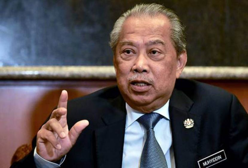 内政部长丹斯里慕尤丁。