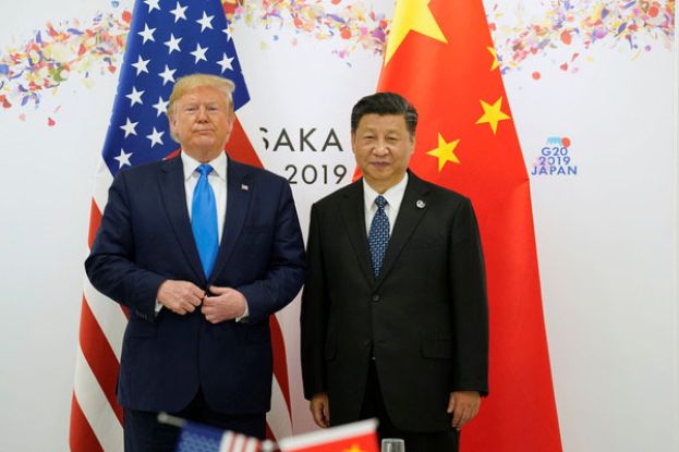 特朗普（左）与习近平（右）5日晚通话。