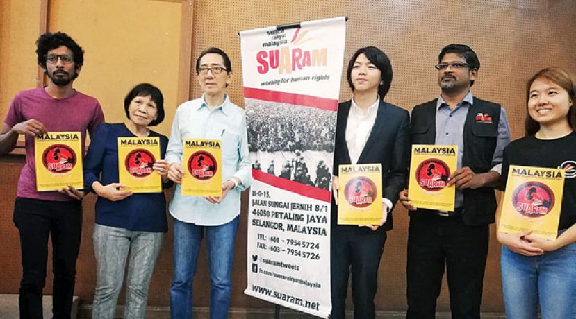 人民之声顾问柯嘉逊(左3)主持“2019年马来西亚人权报告”推介礼。