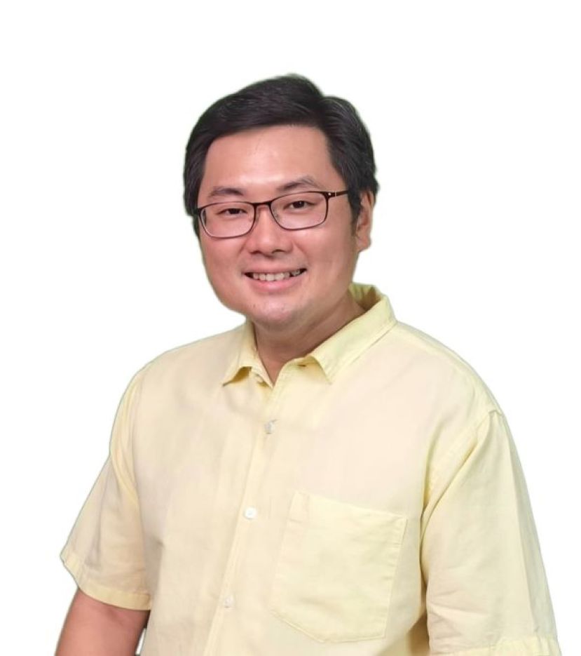 砂人联党古晋支部代秘书兼青年团团长黄笃荣。