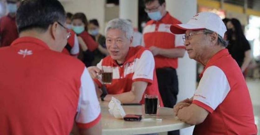 李显扬（左起）与前进党党魁陈清木共进早餐。