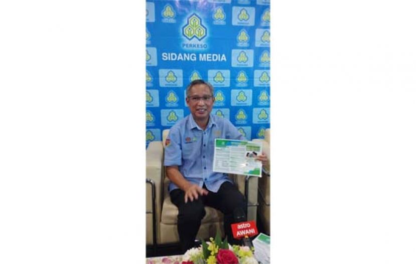 砂社会保险机构局局长菲利桑干在汇报会上向媒体发表谈话时摄。