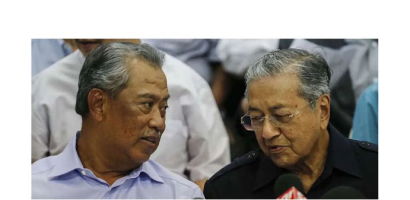 左为慕尤丁和敦马哈迪(右)。