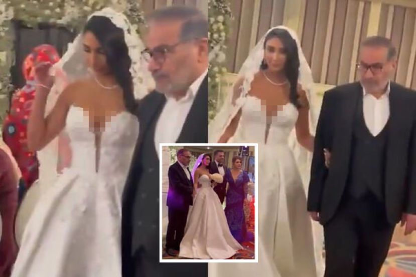 影片中可见，新娘头发披散、穿著露肩婚纱走进会场。