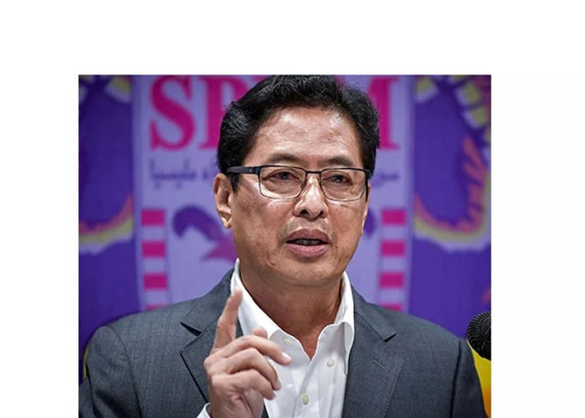 丹斯里阿占巴基。