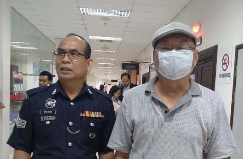 前资深律师郑惠丰被带离法庭时摄。