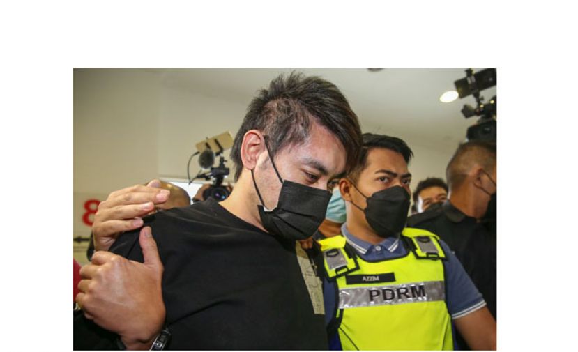 廖顺喜被押上沙亚南地庭时摄。