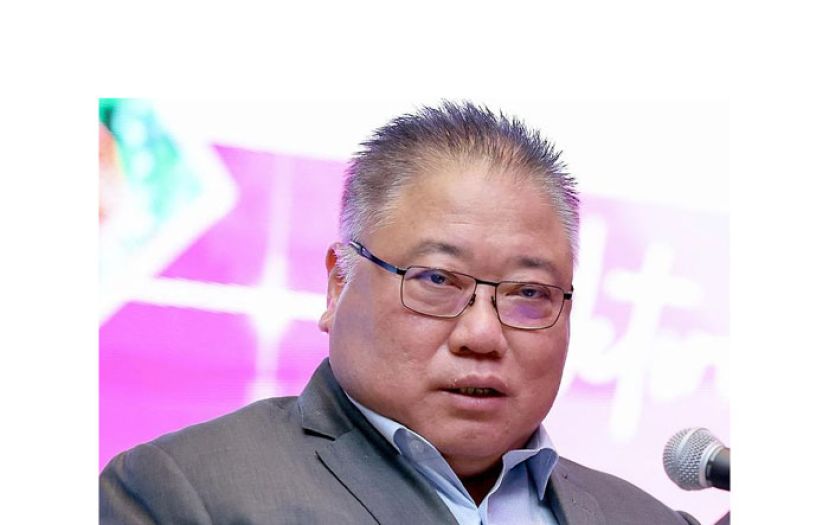 拿督斯里张庆信。