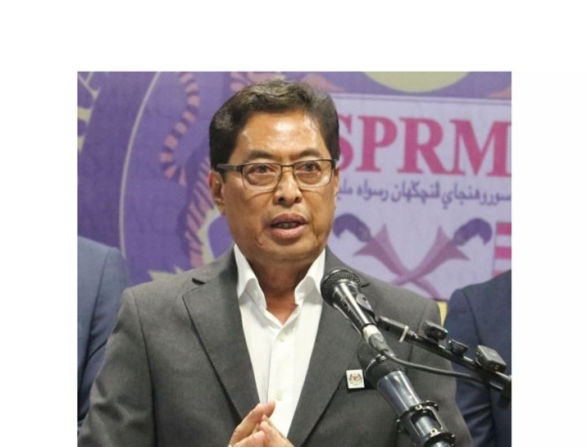 丹斯里阿占巴基。